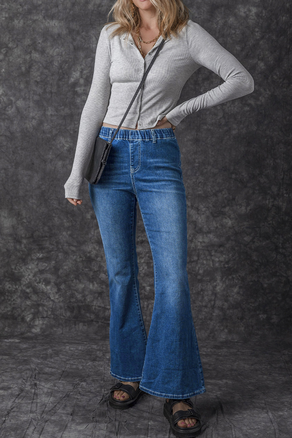 Jeans a bagliore a vita alta elastica blu