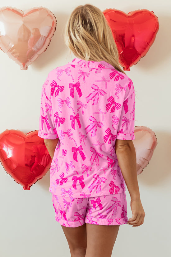 Ensemble pyjama rose avec chemise à manches mi-longues et short à imprimé nœud