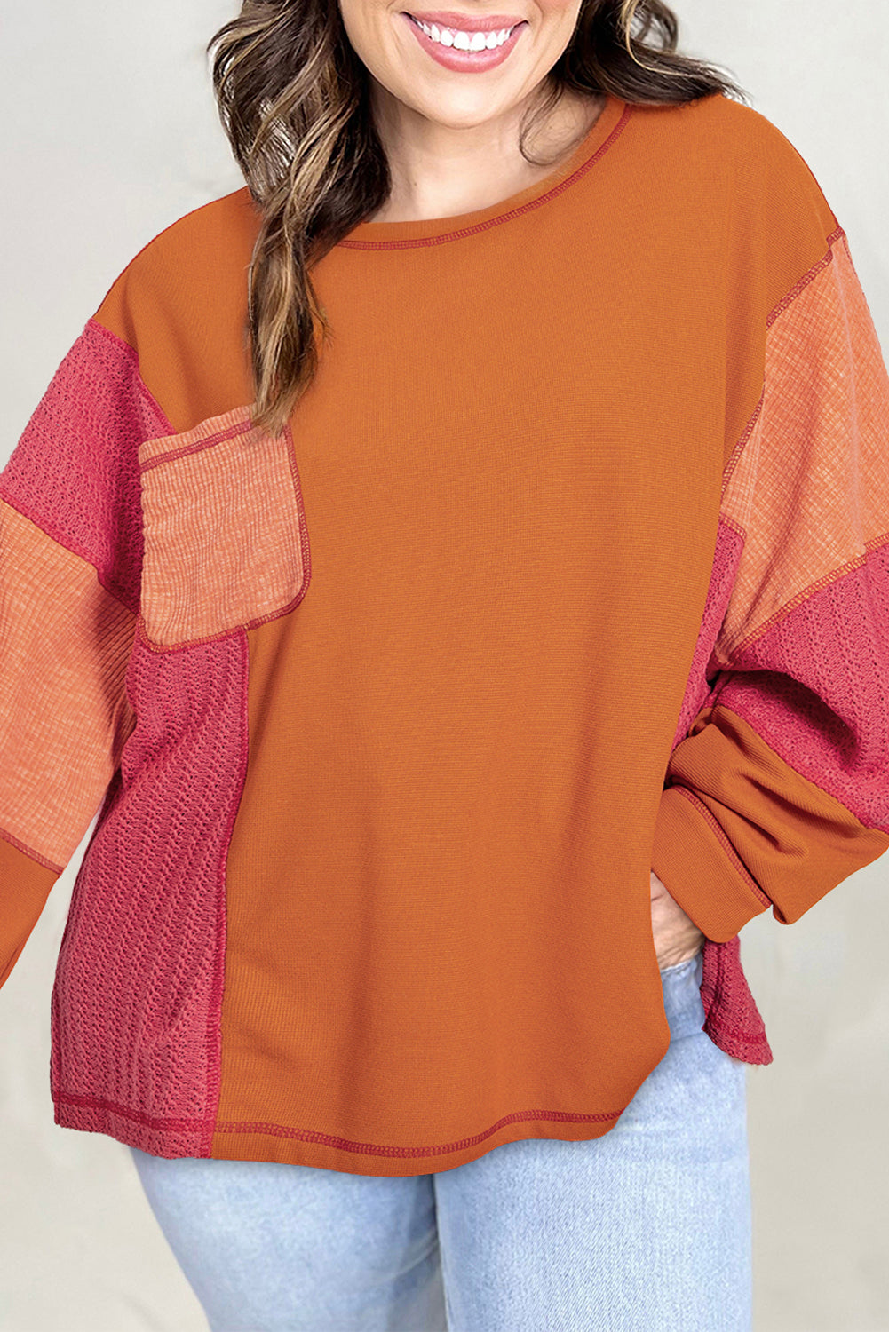 Haut orange en tricot texturé avec bloc de couleurs *