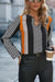 Orange blouse with geometric print and color block notch collar