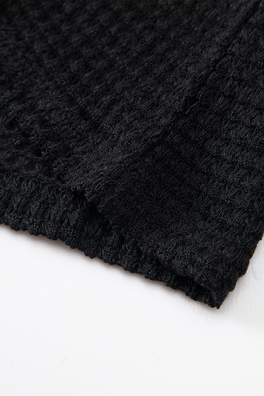 Black high with long sleeves and drooping shoulders *