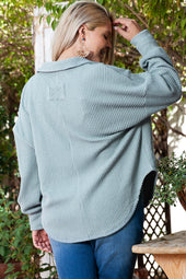 Beautiful Blue - High textured folded down to V -neck and drooping shoulders of large size