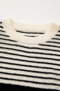 Pull sans manches à col rond rayé noir et blanc *