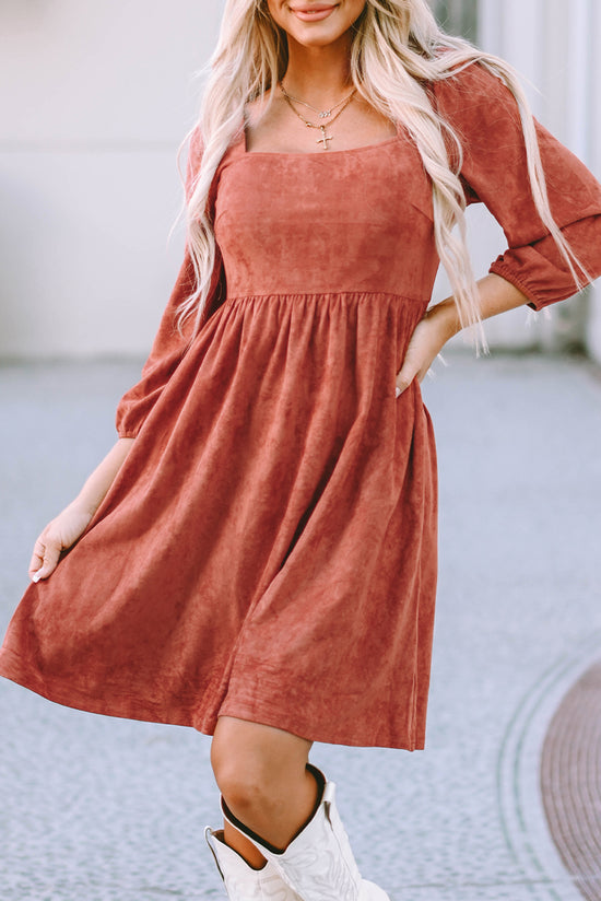 Brown suede dress with square neck and puffed sleeves