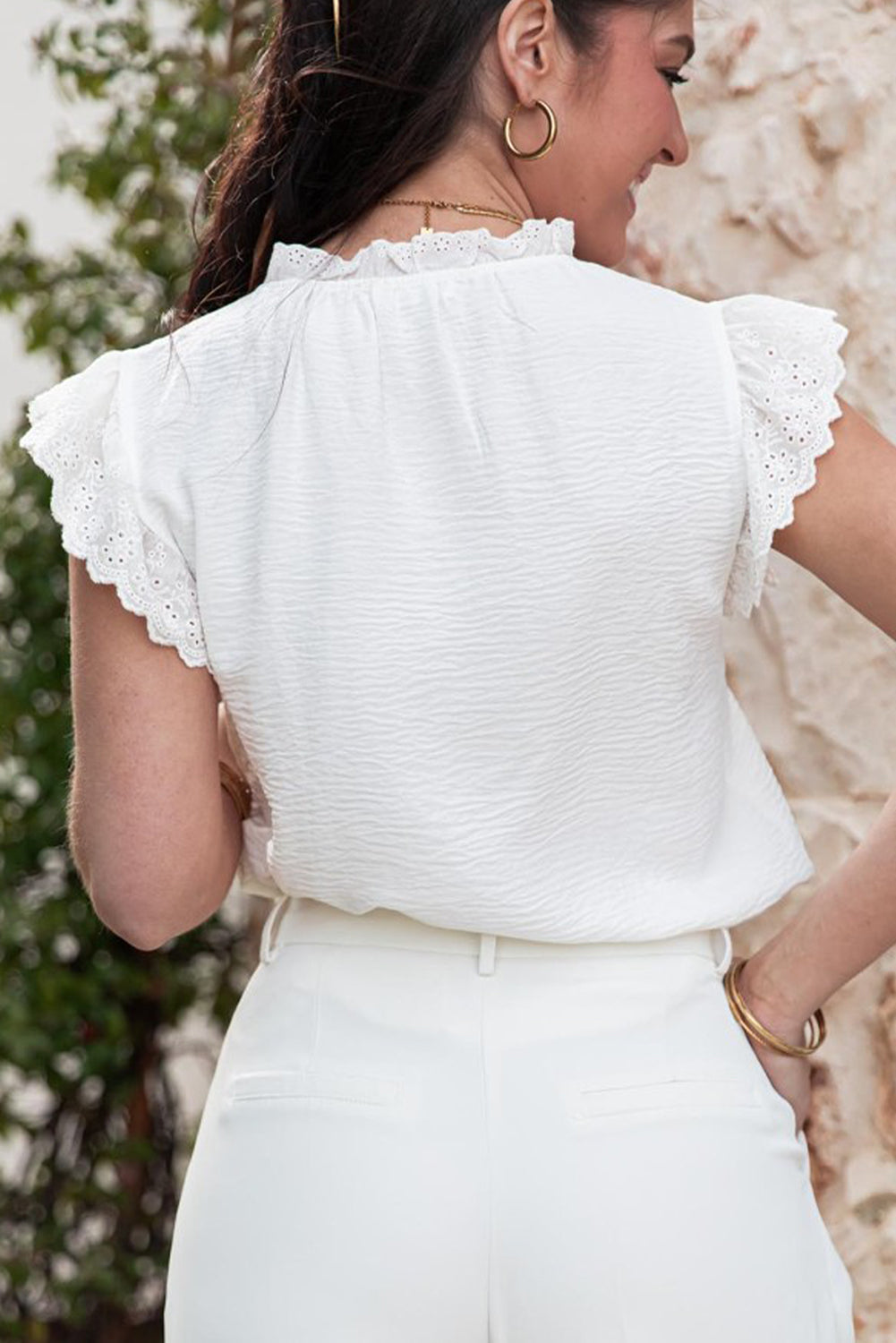 White textured blouse with embroidered ruffles *