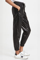 Pantalones de trote negros en tamaño simocked y cordón de apriete