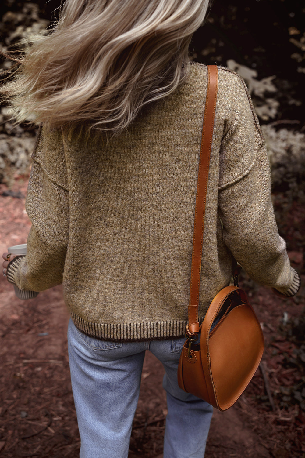 Pale khaki sweater with dropped shoulders and high neck with contrasting trim