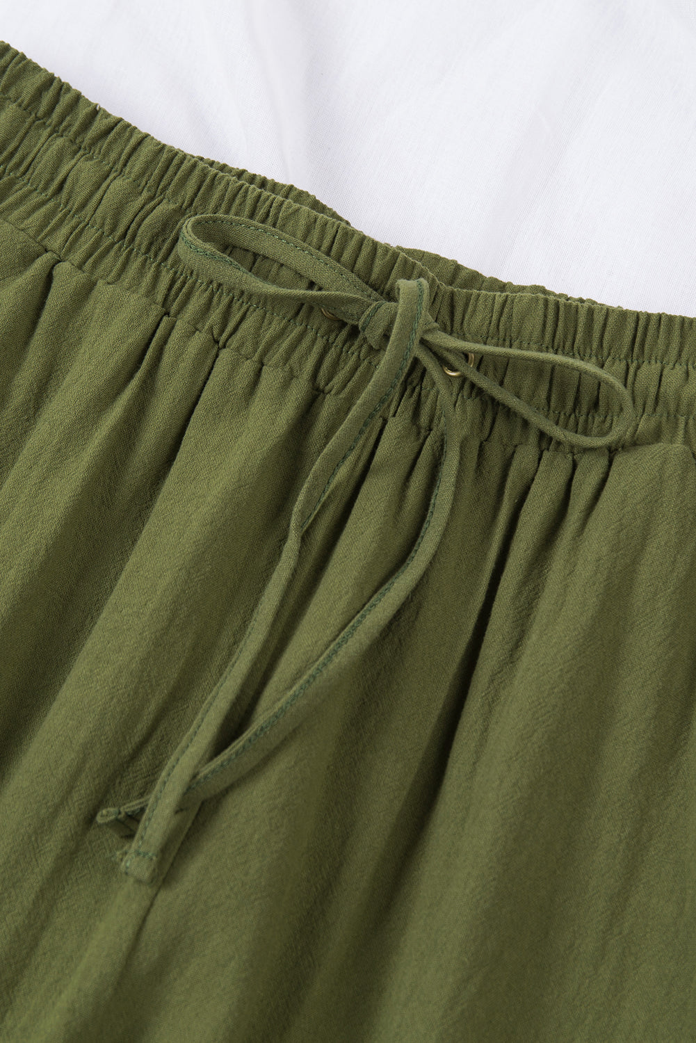 Pantalones bolsillos con cordón elástico en la cintura perneras largas y rectas verde