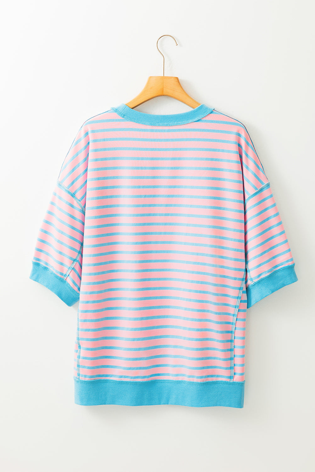 T-shirt up and down with pink stripes, oversized, contrasting border, exposed seams