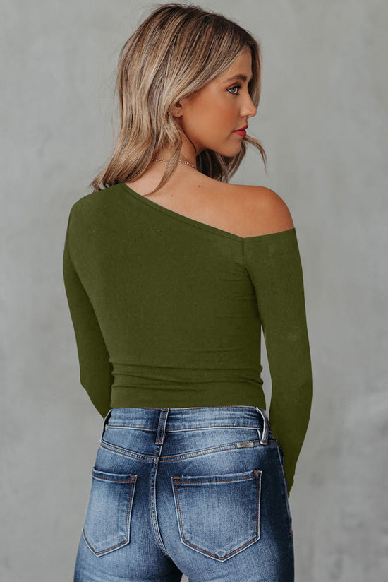 Green long sleeve knit top with asymmetrical neckline