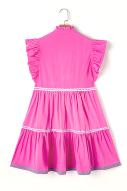 Dress on several levels with V -collar and floating sleeves Colorblock Ric Rac pink strawberry