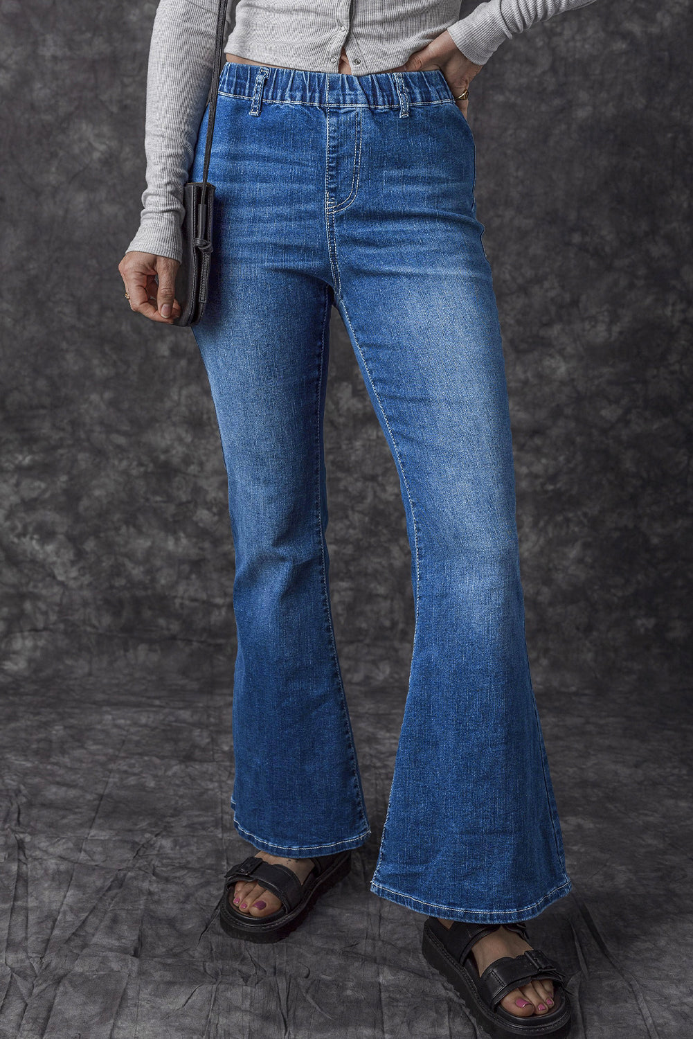 Jeans a bagliore a vita alta elastica blu