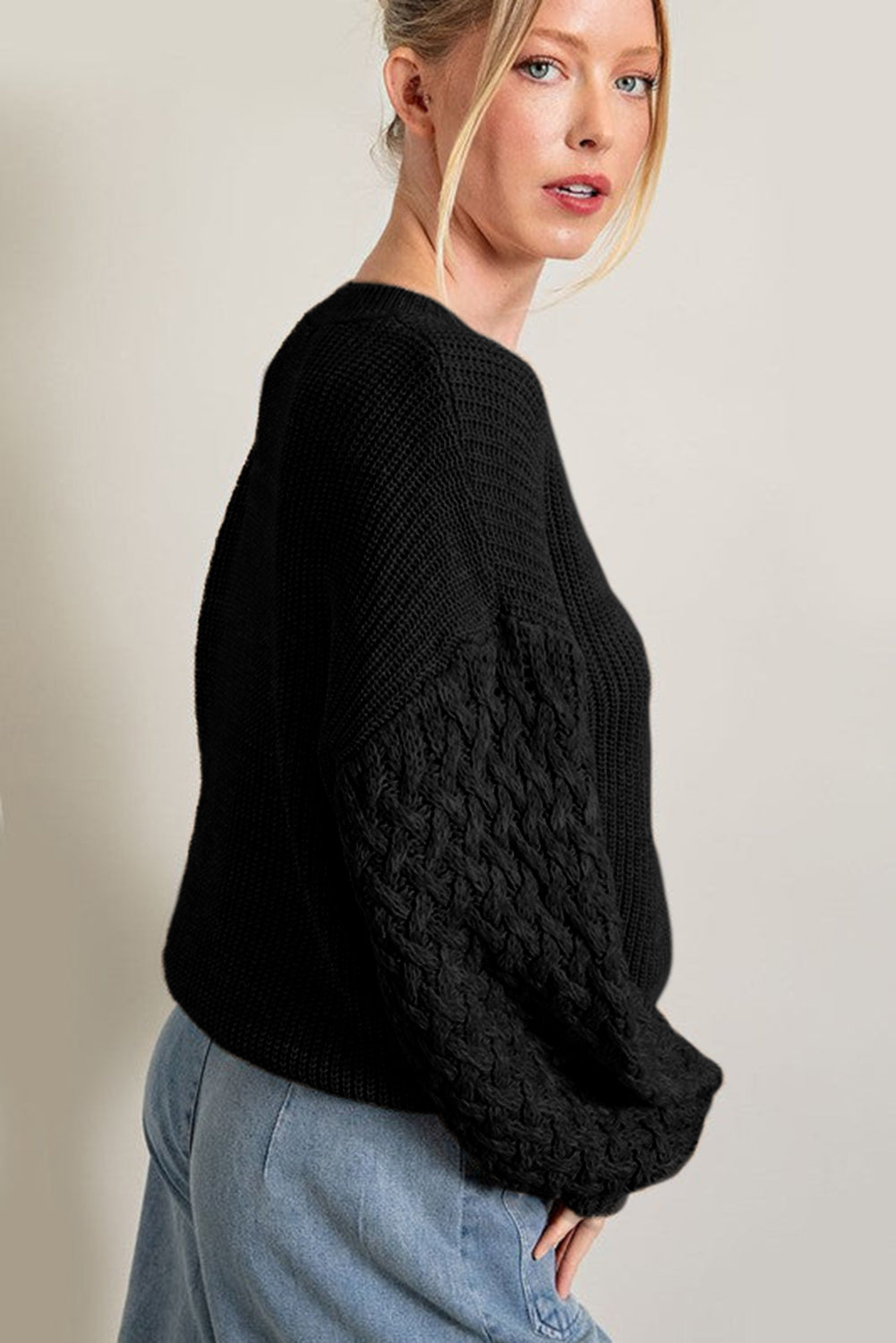 Pull d'épaule à manches en tricot noir