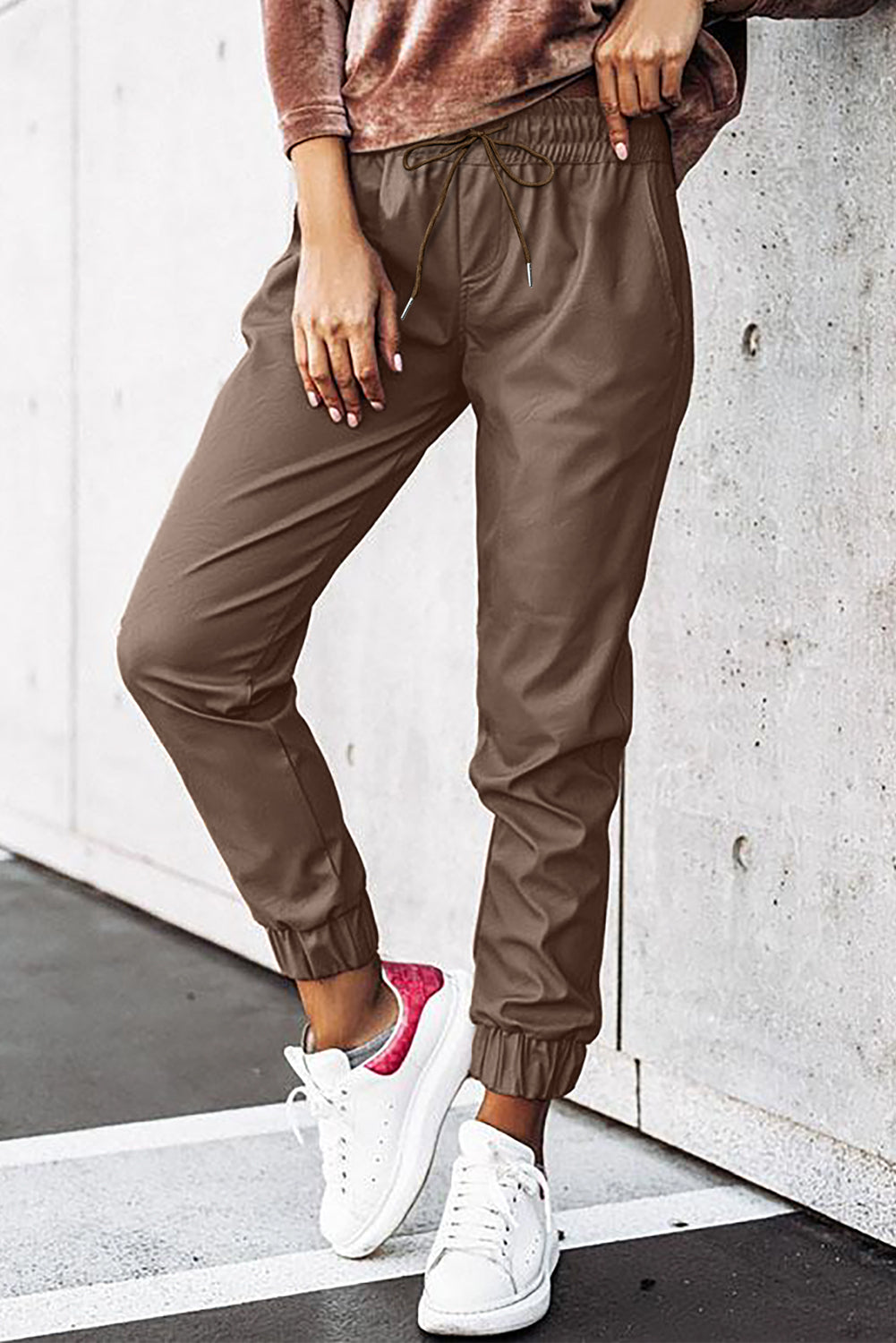 Brown leather jogging pants with waist tie