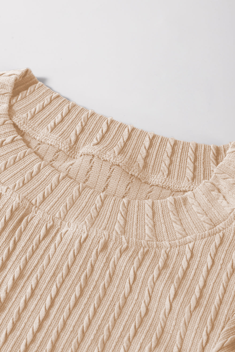 Beige high with textured floating sleeves *