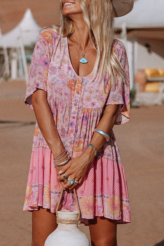 Multicolored ruffled mini dress with hibiscus floral print