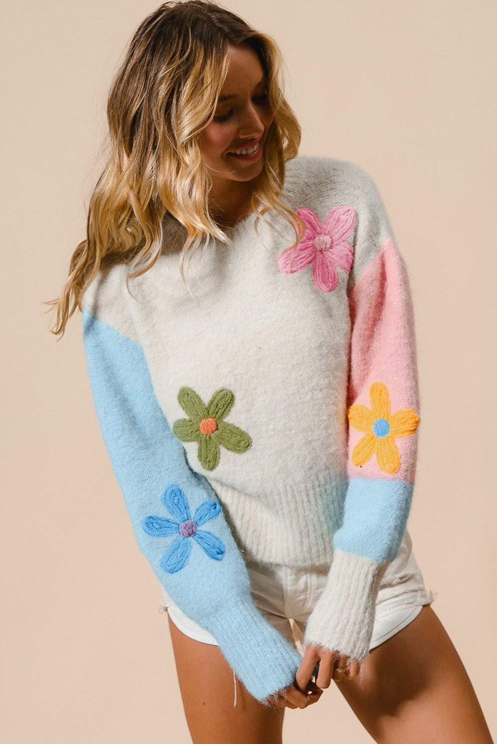 Multicolored sweater with dropped shoulders and multicolored floral embroidery