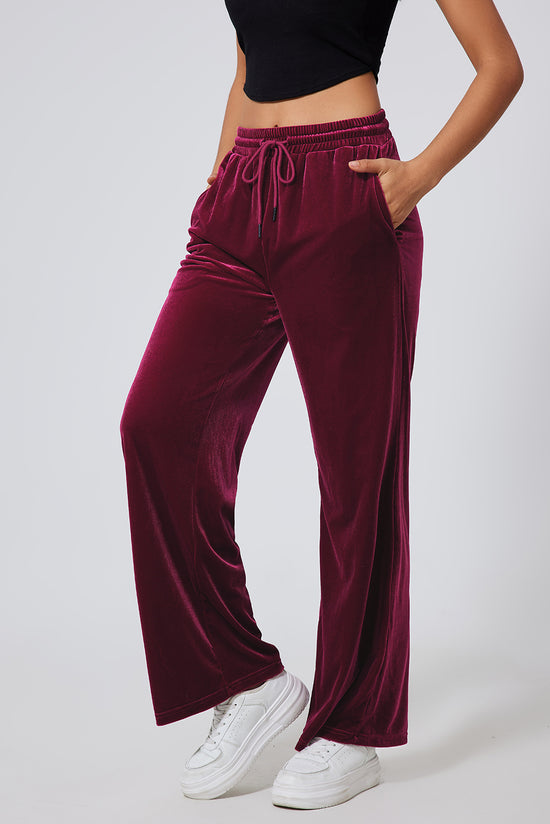 Large burgundy pants with size with tightening cord