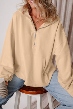 Loose-fitting half-zip hoodie with parchment fleece-lined kangaroo pockets