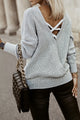 Gray haked sweater in the cross -back