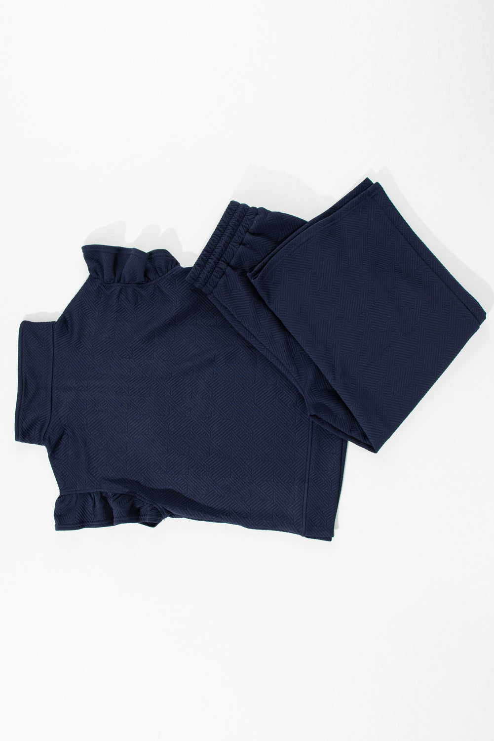 Pantaloni a gamba con manicotto flutter a blu navy