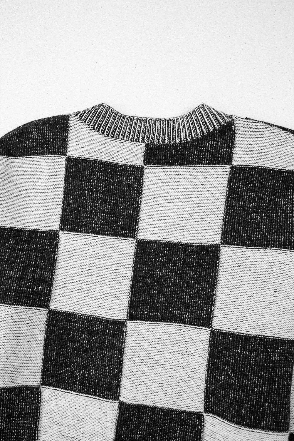 Cardigan noir à carreaux et épaules tombantes boutonné à col en V-A WOMAN WE LOVE
