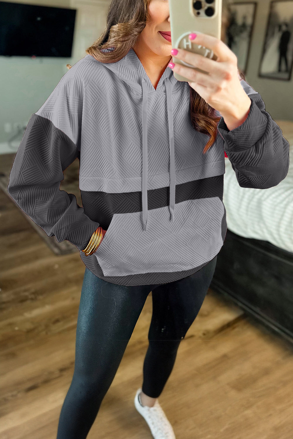 Grey textured hoodie with kangaroo pocket and dropped shoulders