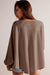 Long -sleeved loose blouse and V -winged V -neck collar