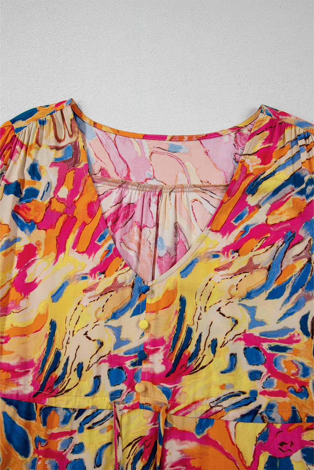 Pink fluid dress with flared sleeves *