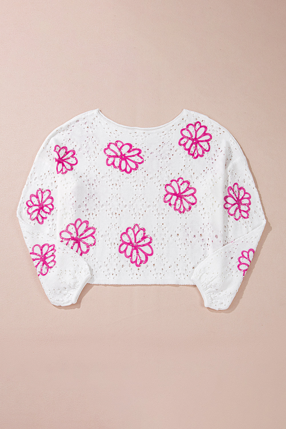 White drop shoulder sweater with contrast floral print eyelets