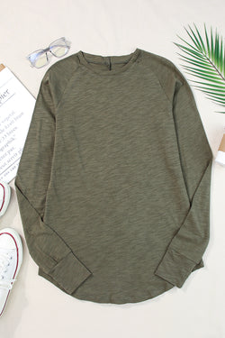 Solid green top with long sleeves and round neck