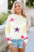 White loose sweater with colorful star pattern