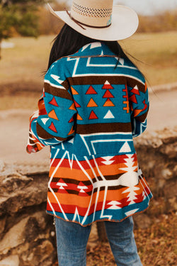 Chaqueta azul cielo con mangas de campana y azteco impreso