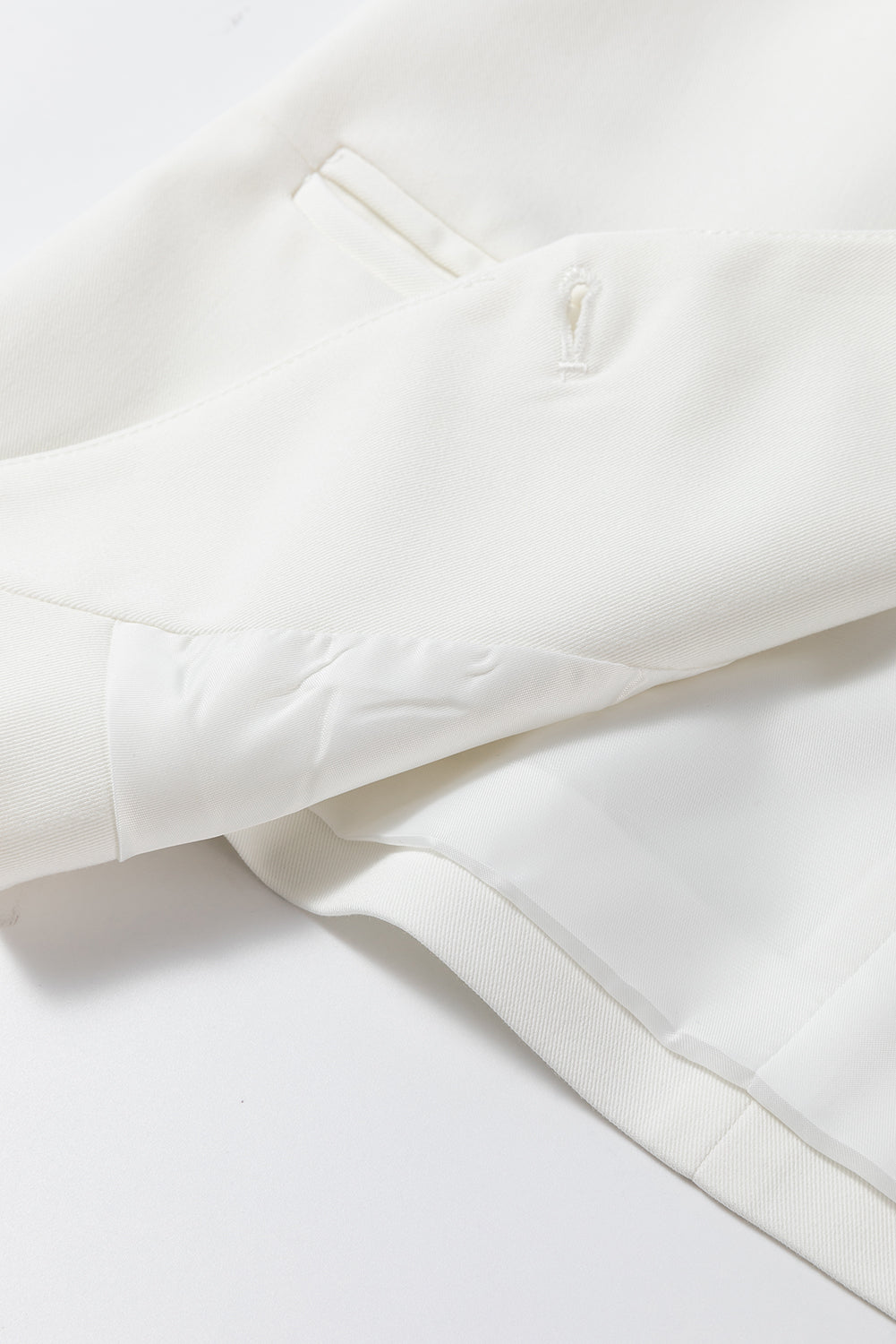 White costume vest with united buttoned V -neck colored
