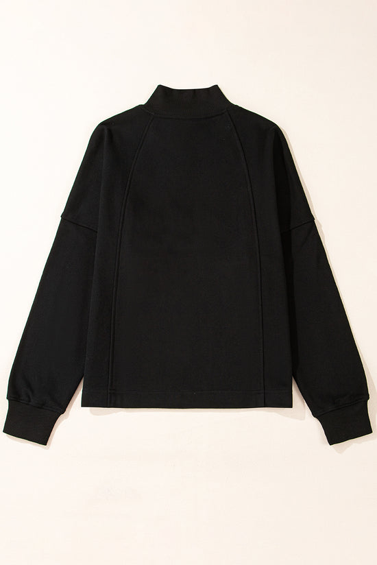 Black zip-up sweatshirt with dropped shoulders