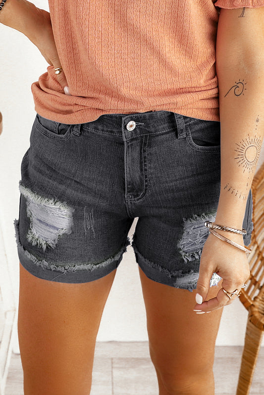 Destgierte gerollte Saumschwarze Denim -Shorts zerrissene Saum