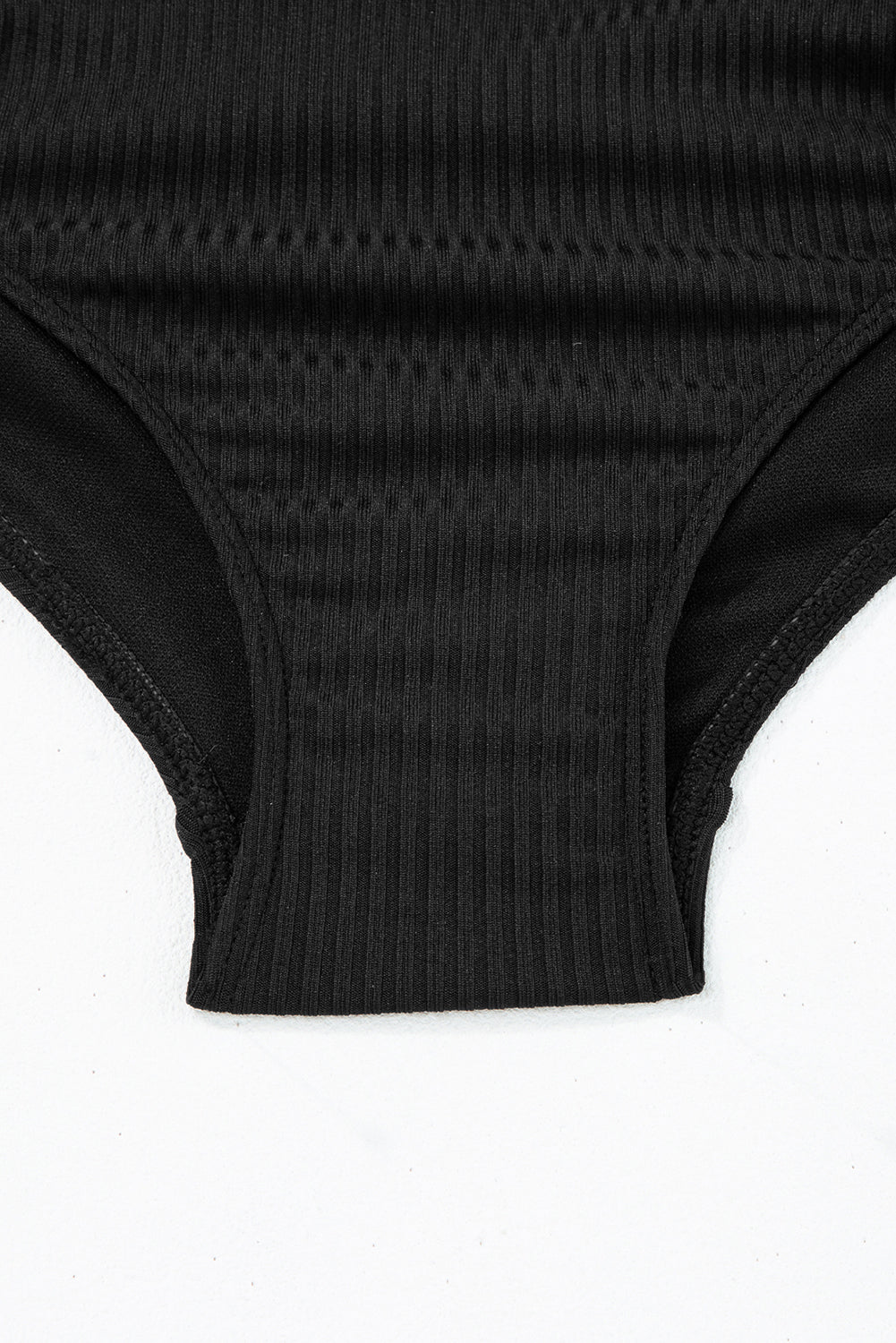 Bathroom A ribbed black room *
