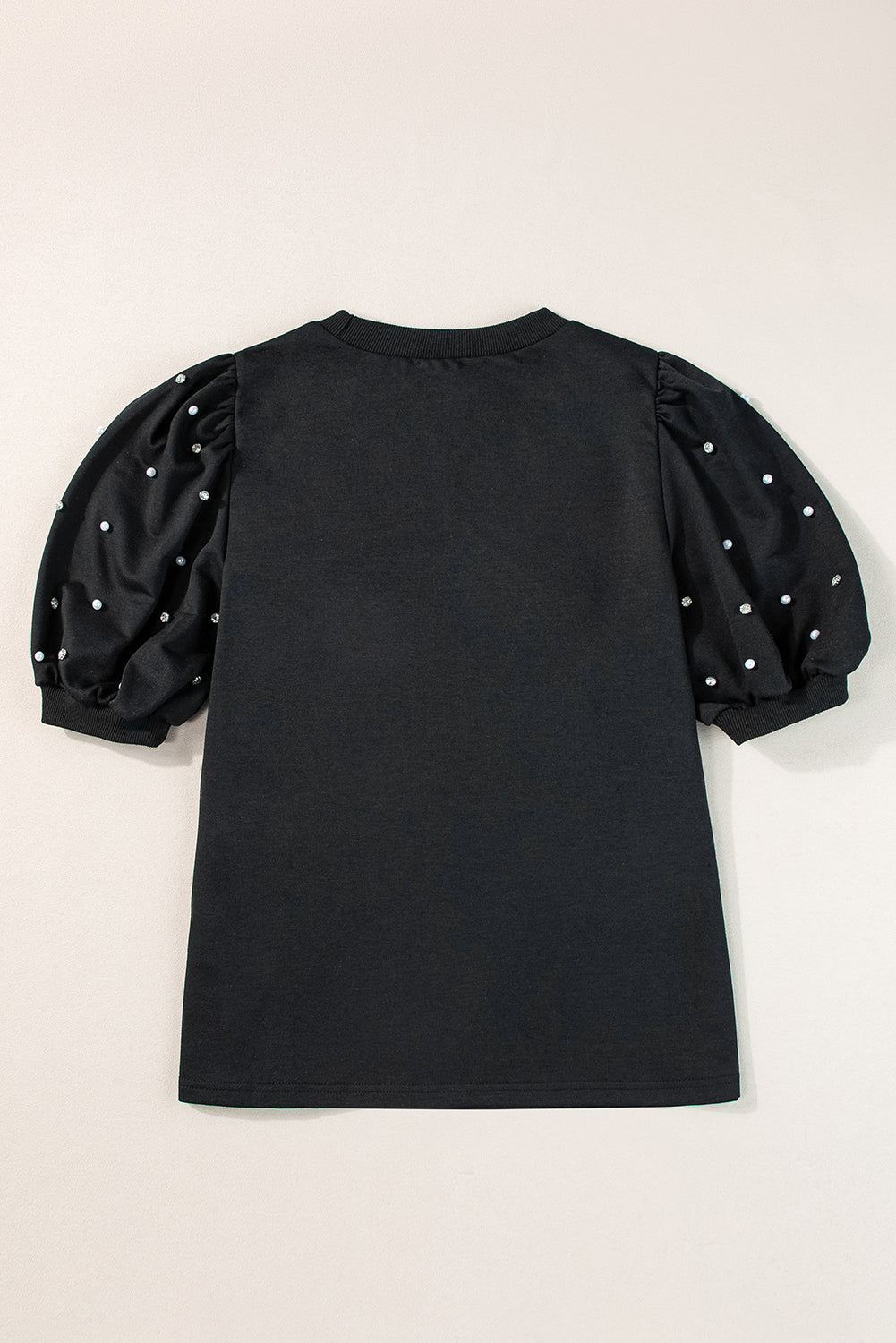 Black top with mid-long puffing sleeves with pearls and rhinestones