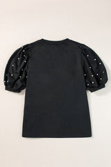 Black top with mid-long puffing sleeves with pearls and rhinestones