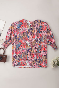 3/4 -leveled frowned tunic blouse and multicolored floral print