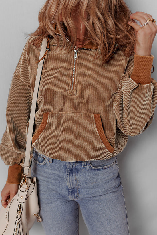 Brown corduroy hoodie with half zip and kangaroo pocket with drawstring