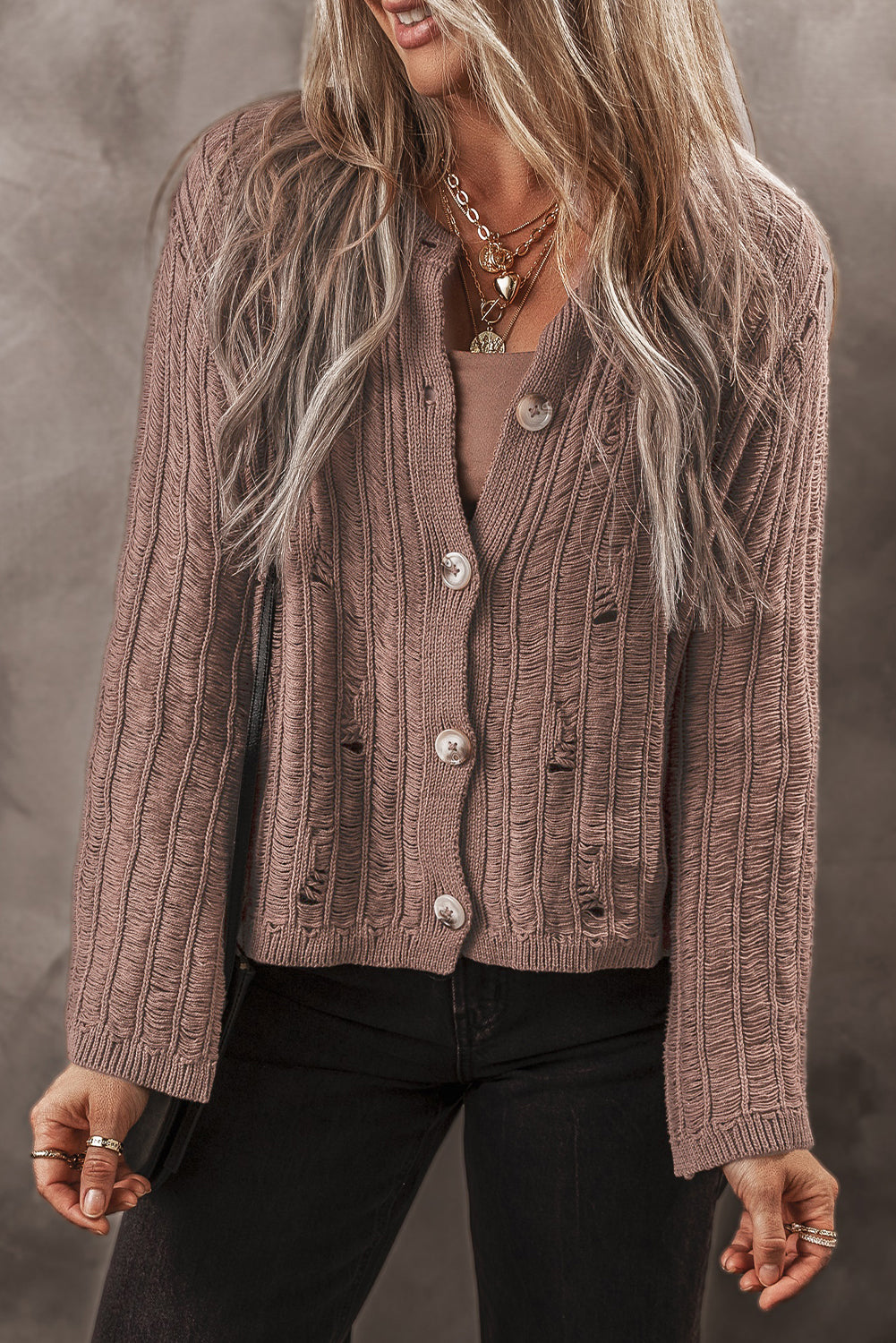 Cardigan boutonné en tricot texturé découpé en chèvre