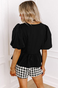 Chemise péplum noire à manches bouffantes *