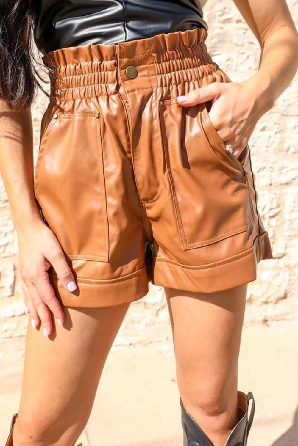 Brown faux leather high waisted shorts with patch pockets