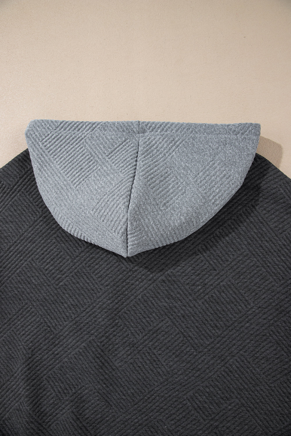 Grey textured hoodie with kangaroo pocket and dropped shoulders