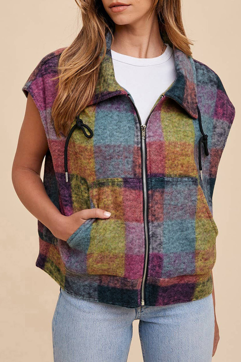 A large zipped vest with multicolored Scottish print with side pockets