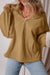 Brown loose hoodie with kangaroo pockets and half-zip lined with fleece