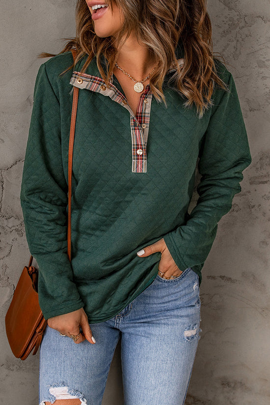 Green sweatshirt with geometric texture and plaid border