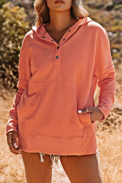 Henley orange hoodie with bat pockets and sleeves