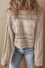 Pull court en tricot torsadé ajouré gris fumée